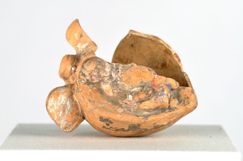 Ceramic peach ornament from the Market Street Chinatown exhibit.