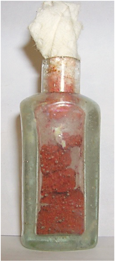 Medicine vial with red cinnabar residue excavated from Market Street Chinatown.