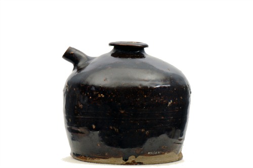 Brown glazed stoneware sauce jar from the Market Street Chinatown exhibit.